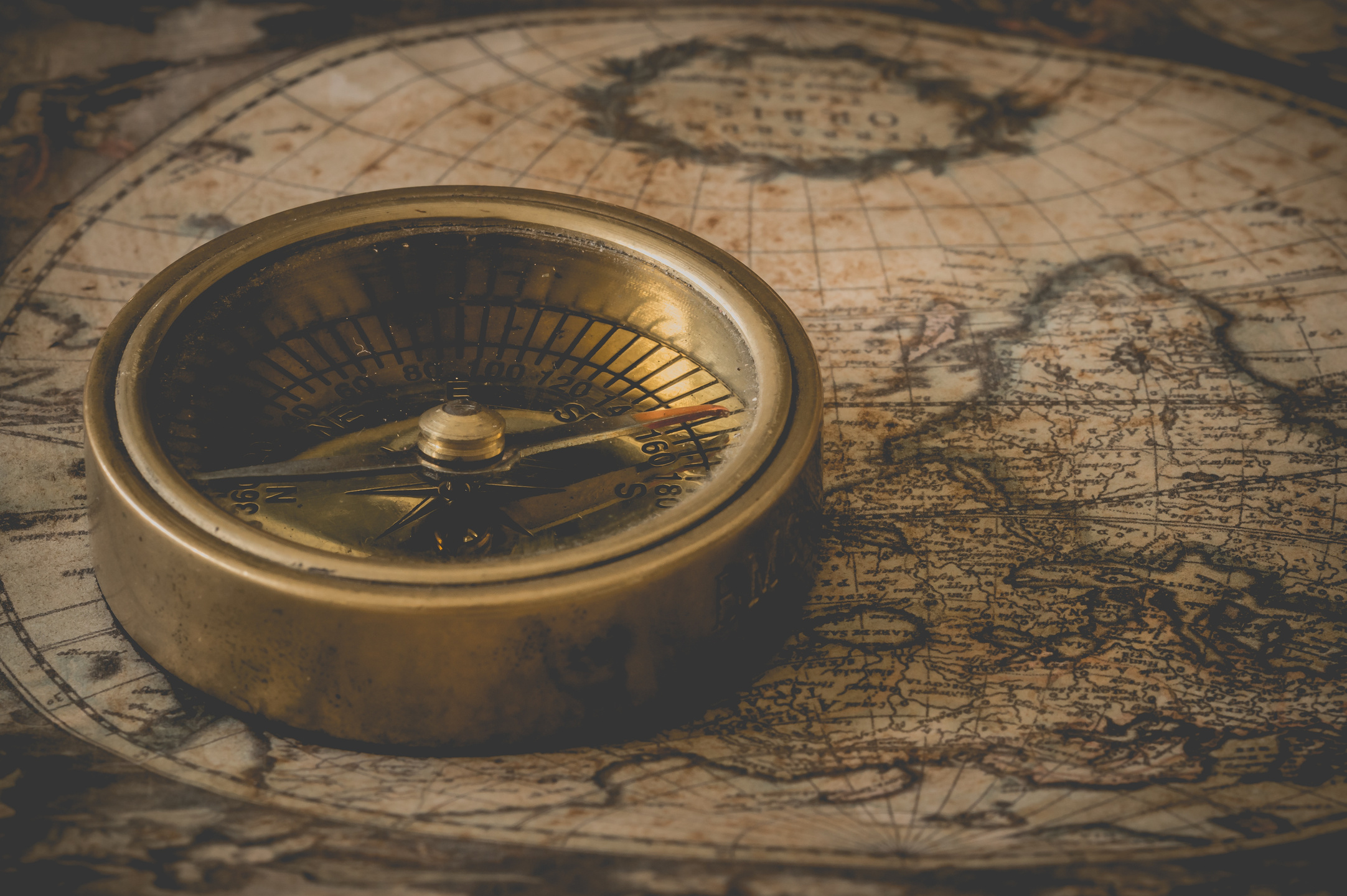 Compass on a Vintage Map